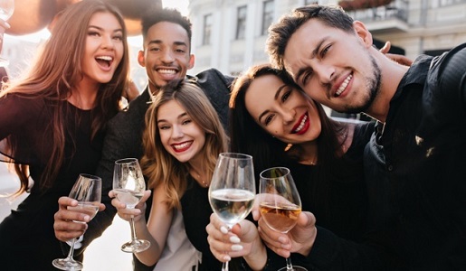 Friends having fun drinking wine