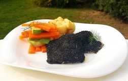 Filetto di salmerino con panure al nero di seppia